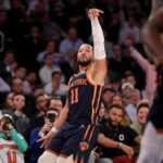 New York Knicks guard Jalen Brunson (11) watches his three point shot against the Indiana Pacers during the fourth quarter at Madison Square Garden.