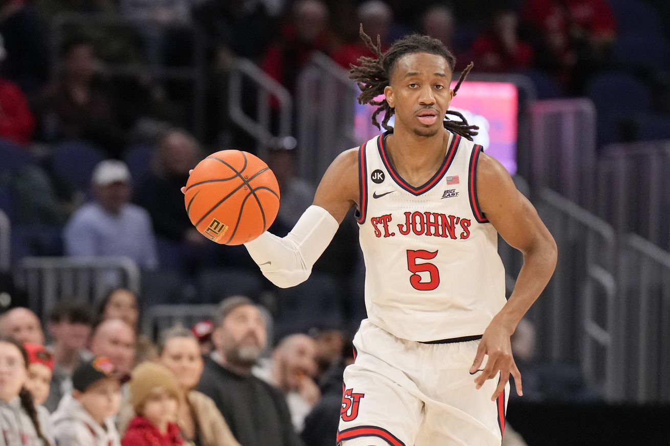 Daniss Jenkins #5 of the St. John’s Red Storm dribbles the ball against the DePaul Blue Demons during a game at UBS Arena on February, 6, 2024 in Elmont, NY. (Photo by Porter Binks/Getty Images).