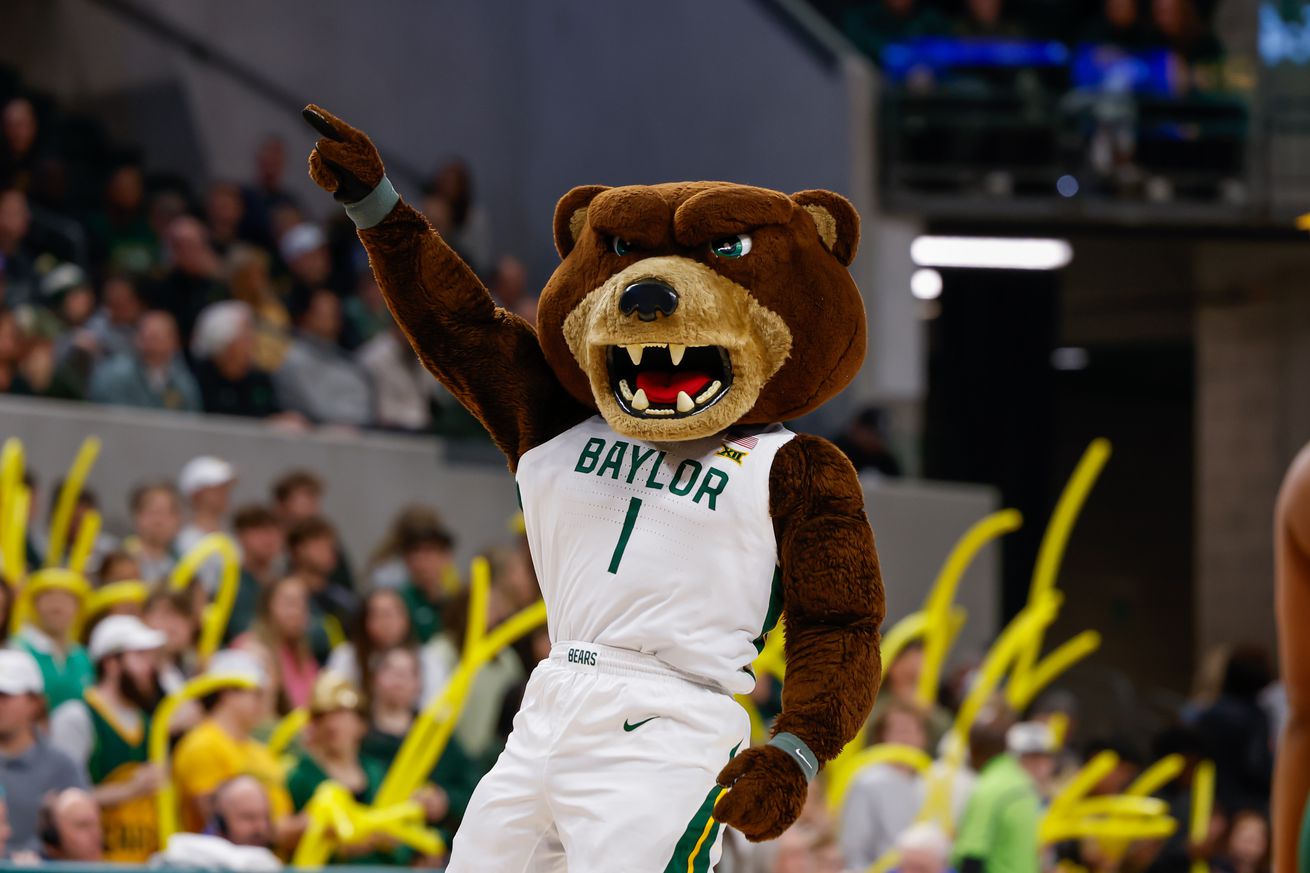 Baylor mascot Bruiser the Bear hypes the crowd during the Big 12 college basketball game between Baylor Bears and BYU Cougars on January 9, 2024, at Foster Pavilion in Waco, Texas.