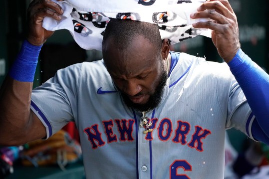 Jun 21, 2024; Chicago, Illinois, USA; New York Mets outfielder Starling Marte (6) cools off in the dugout against the Chicago Cubs during the seventh inning at Wrigley Field. Mandatory Credit: David Banks-USA TODAY Sports