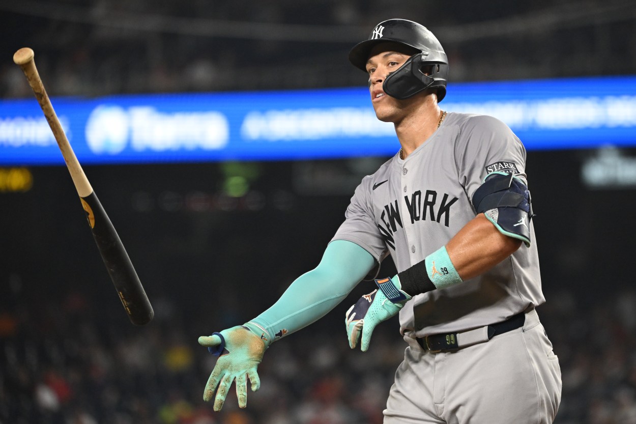 Aug 28, 2024; Washington, District of Columbia, USA; New York Yankees center fielder Aaron Judge (99) tosses his bat after drawing a walk against the Washington Nationals during the eighth inning at Nationals Park. Mandatory Credit: Rafael Suanes-USA TODAY Sports