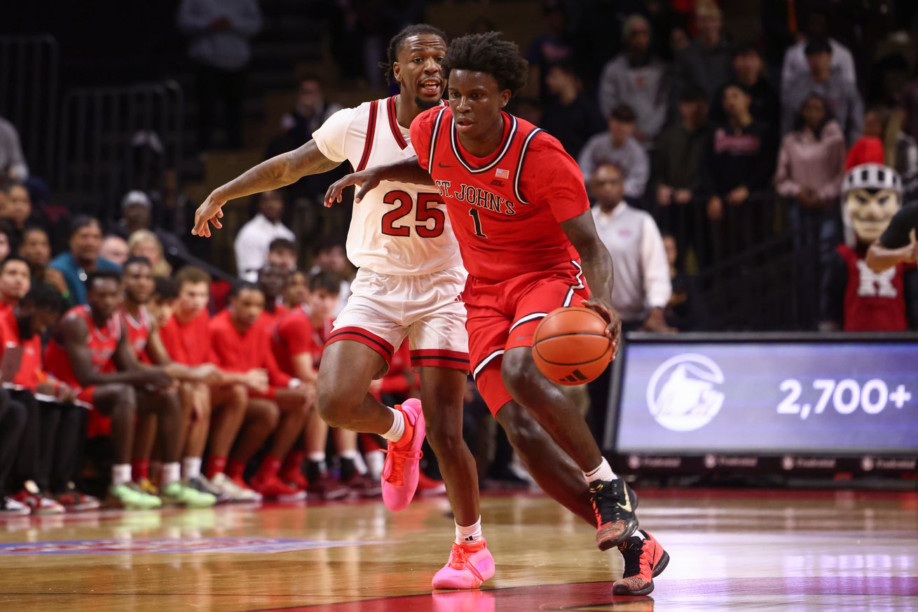 Kadary Richmond #1 of the St. John’s Red Storm dribbles the ball while being defended by Jeremiah Williams #25 of the Rutgers Scarlet Knights during the first half at Jersey Mike’s Arena on October 17, 2024 in Piscataway, New Jersey.