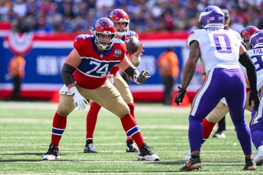 Sep 8, 2024; East Rutherford, New Jersey, USA; New York Giants guard Greg Van Roten (74) pass protects against Minnesota Vikings linebacker Ivan Pace Jr. (0) during the second half at MetLife Stadium. Mandatory Credit: John Jones-Imagn Images