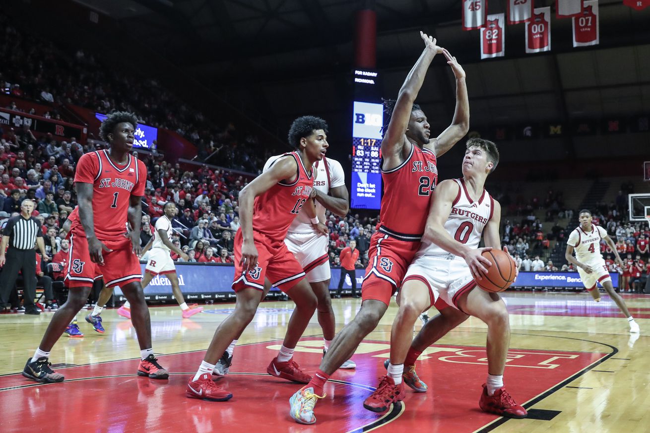 Rutgers Scarlet Knights guard Jordan Derkack (0) looks to post up against St. John’s Red Storm forward Zuby Ejiofor (24) in the second half at Jersey Mike’s Arena. Mandatory Credit: Wendell Cruz-Imagn Images