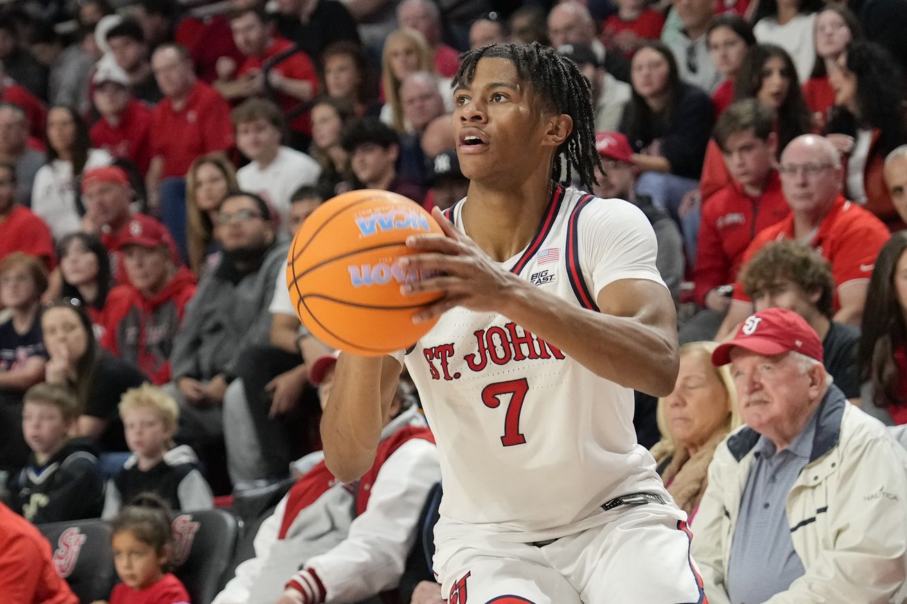 NEW YORK, NY - OCTOBER 26: Simeon Wilcher #7 of the St. John’s Red Storm dribbles the ball in the second half of a college basketball game against the Towson Tigers at Carnesecca Arena on October 26 2024 in the Queens borough of New York City.