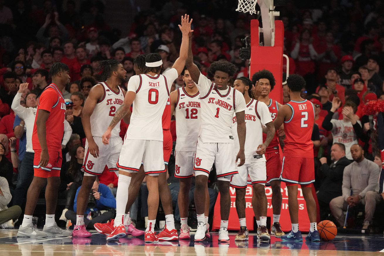 NEW YORK, NY - NOVEMBER 12: Aaron Scott #0 and Kadary Richmond of the St. Johns Red Storm celebrate a shot during a college basketball game against the New Mexico Lobos at Madison Square Garden on November 12, 2024 in New York, New York.