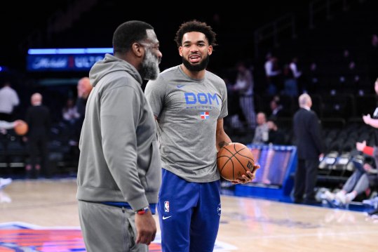 Nov 13, 2024; New York, New York, USA; New York Knicks center Karl-Anthony Towns (right) talks with Chicago Bulls assistant coach Marl Bryant before a game against the Chicago Bulls at Madison Square Garden. Mandatory Credit: John Jones-Imagn Images