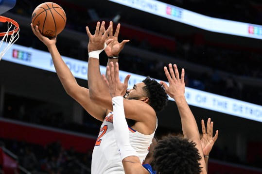 Nov 1, 2024; Detroit, Michigan, USA; New York Knicks center Karl-Anthony Towns (32) drives to the basket against the Detroit Pistons in the third quarter at Little Caesars Arena. Mandatory Credit: Lon Horwedel-Imagn Images