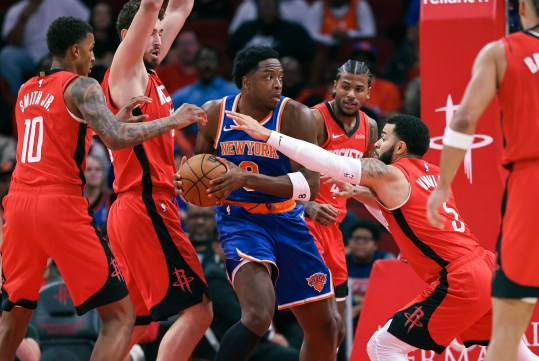 Nov 4, 2024; Houston, Texas, USA; New York Knicks forward OG Anunoby (8) attempts to control the ball as Houston Rockets guard Fred VanVleet (5) defends during the first quarter at Toyota Center. Mandatory Credit: Troy Taormina-Imagn Images