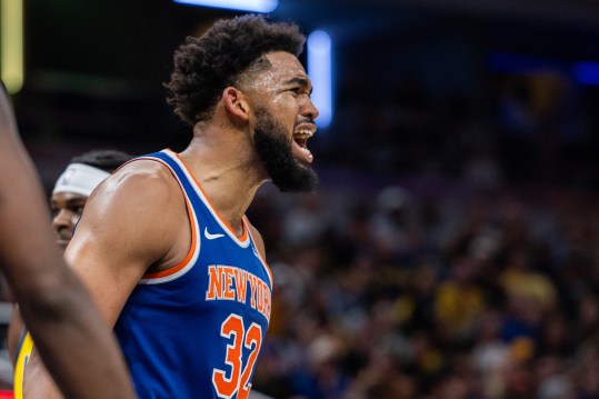 Nov 10, 2024; Indianapolis, Indiana, USA; New York Knicks center Karl-Anthony Towns (32) reacts to an and one basket in the second half against the Indiana Pacers at Gainbridge Fieldhouse. Mandatory Credit: Trevor Ruszkowski-Imagn Images