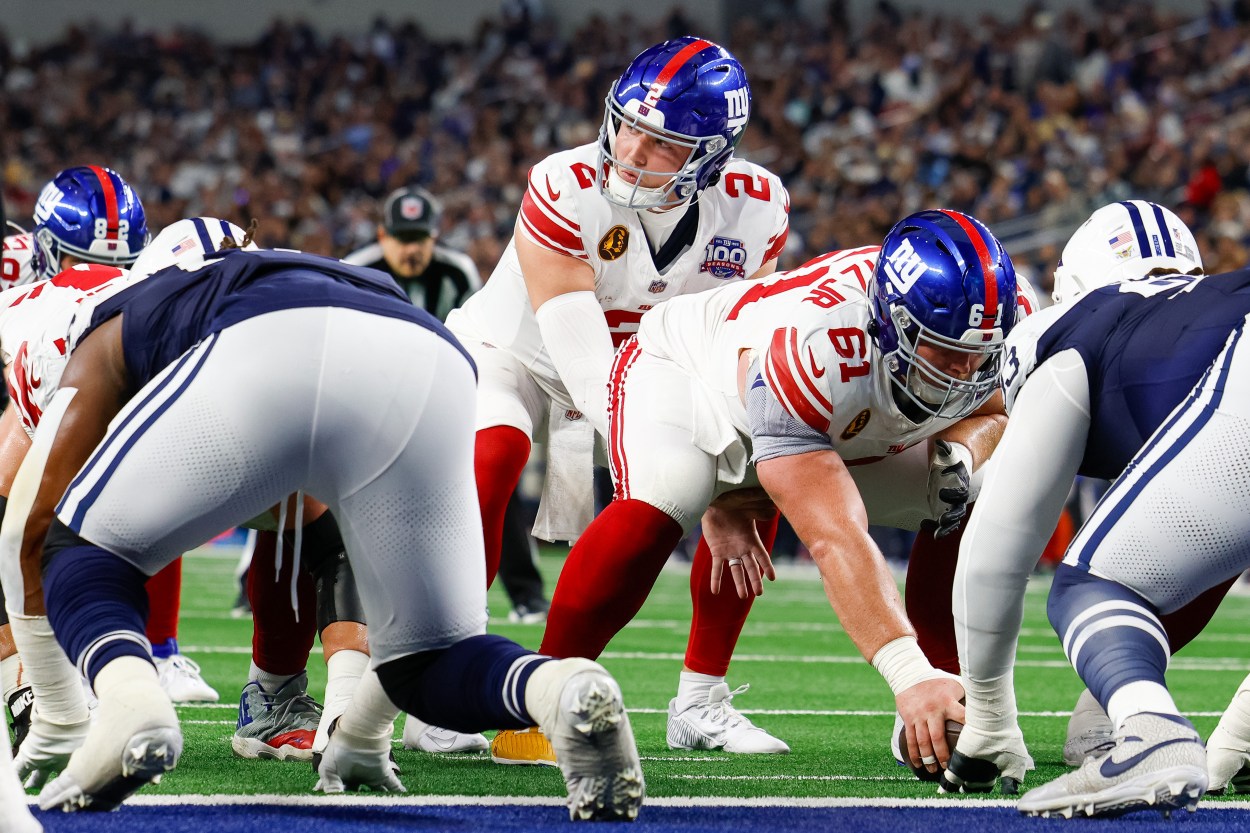 Nov 28, 2024; Arlington, Texas, USA; New York Giants quarterback Drew Lock (2) is under center during the first quarter against the Dallas Cowboys at AT&T Stadium. Mandatory Credit: Andrew Dieb-Imagn Images