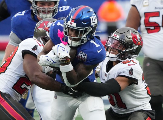 Nov 24, 2024; East Rutherford, New Jersey, USA; New York Giants wide receiver Malik Nabers (1) stopped by the Tampa Bay Buccaneers during the second half at MetLife Stadium. Mandatory Credit: Robert Deutsch-Imagn Images