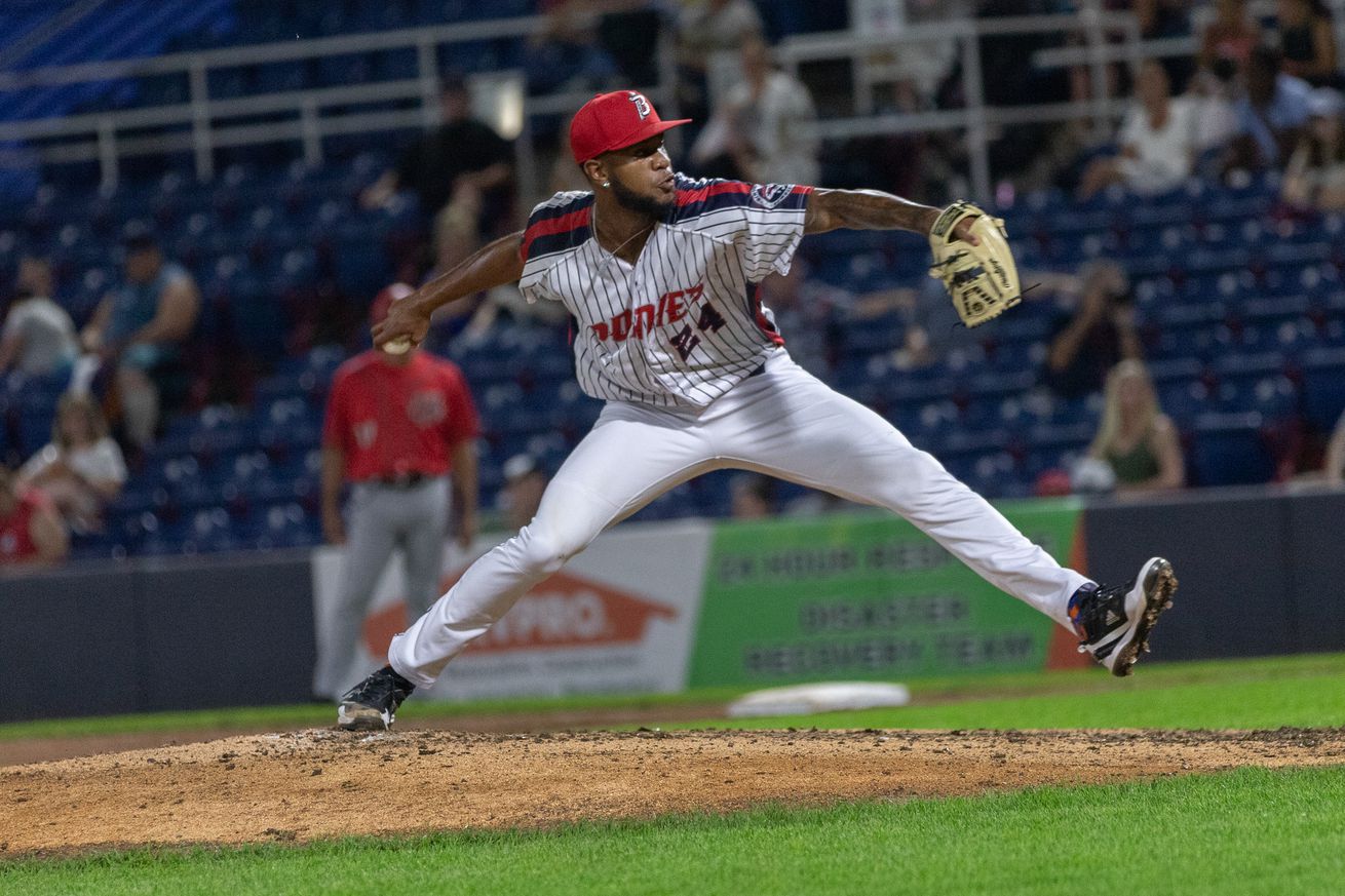 Wilkin Ramos throws a pitch in a Binghamton Rumble Ponies uniform.