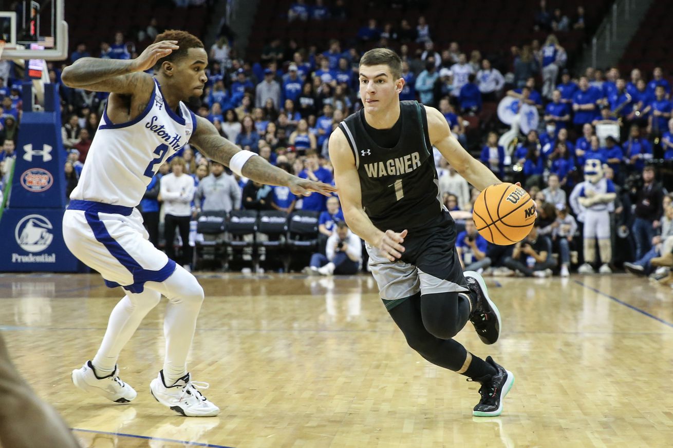 Nov 20, 2022; Newark, New Jersey, USA; Wagner Seahawks guard Javier Ezquerra (1) drives past Seton Hall Pirates guard Al-Amir Dawes (2) in the first half at Prudential Center. Mandatory Credit: Wendell Cruz-Imagn Images