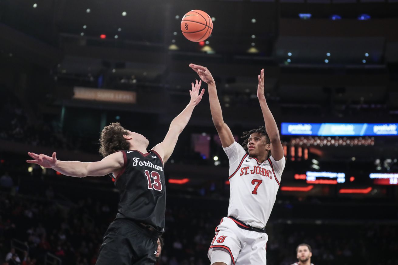 St. John’s Red Storm guard Simeon Wilcher (7) shoots over Fordham Rams guard Zach Riley (13) in the second half at Madison Square Garden. Mandatory Credit: Wendell Cruz