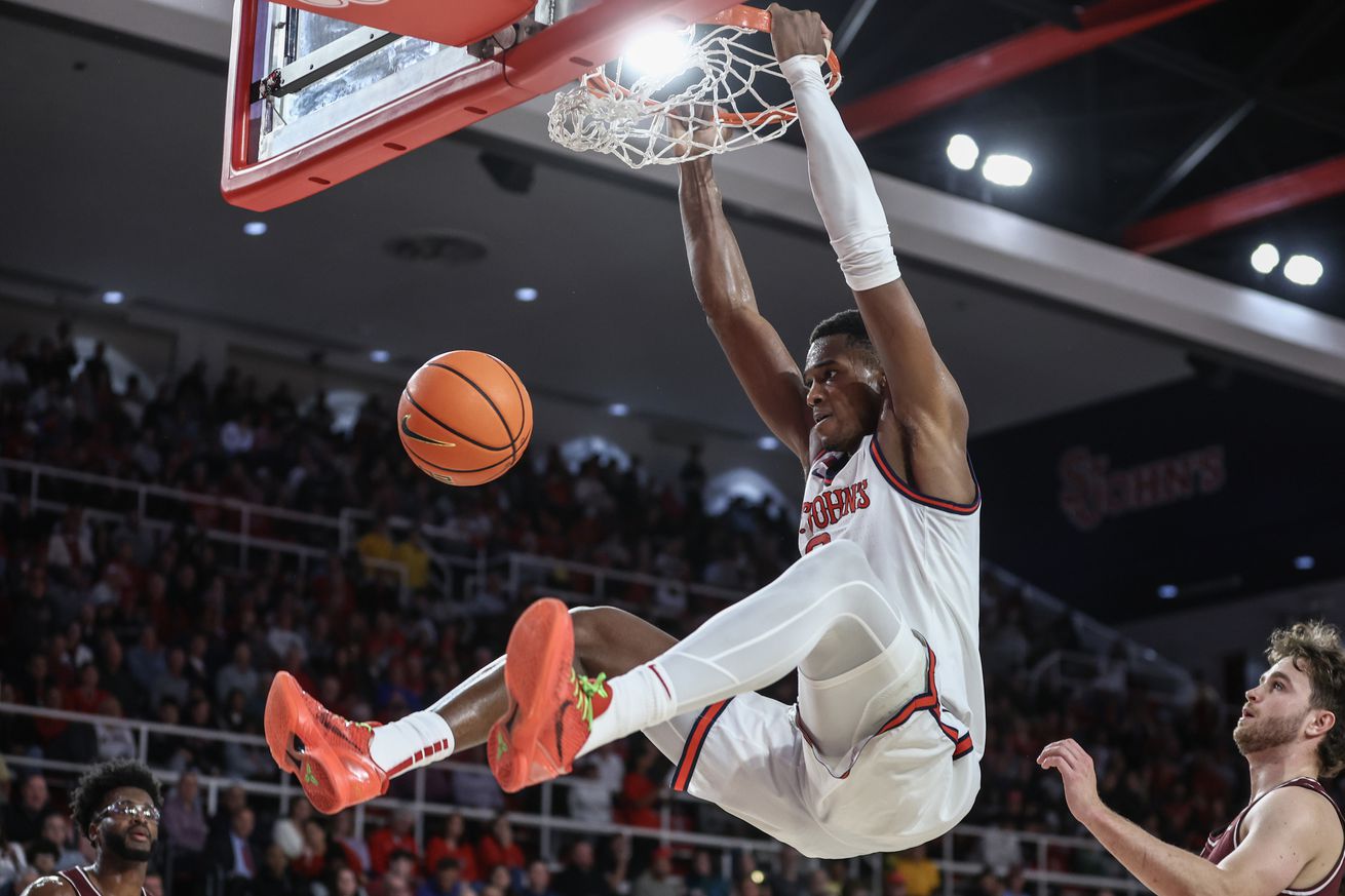 Nov 4, 2024; Queens, New York, USA; St. John’s Red Storm center Vince Iwuchukwu (8) dunks the ball in the second half against the Fordham Rams at Carnesecca Arena. Mandatory Credit: Wendell Cruz-Imagn Images