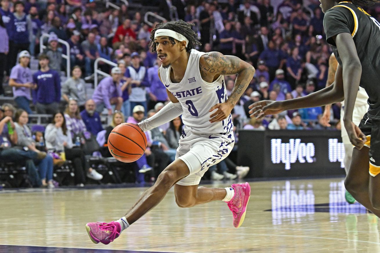 MANHATTAN, KS - DECEMBER 01: Dug McDaniel #0 of the Kansas State Wildcats dribbles the ball up court in the second half against the Arkansas-Pine Bluff Golden Lions at Bramlage Coliseum on December 1, 2024 in Manhattan, Kansas.