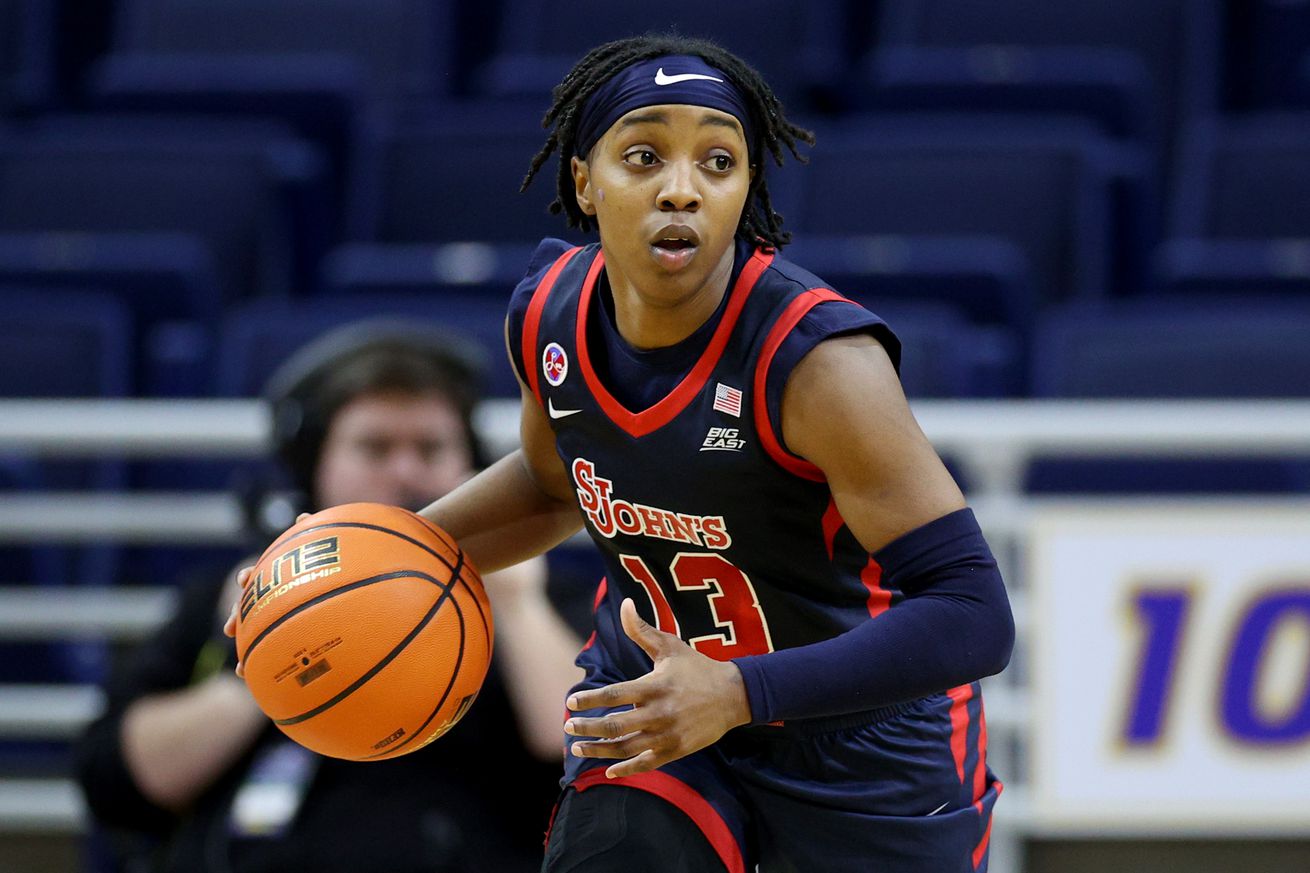 HEMPSTEAD, NEW YORK - DECEMBER 11: Lashae Dwyer #13 of the St. John’s Red Storm dribbles the ball against the Hofstra Pride during the first half at Hofstra University on December 11, 2024 in Hempstead, New York.