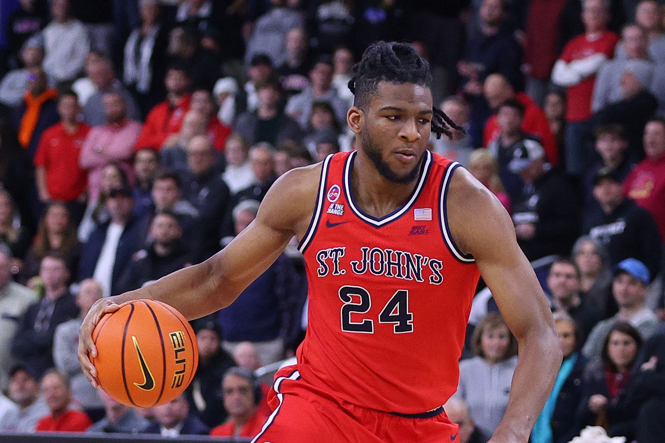 PROVIDENCE, RI - DECEMBER 20: St. John’s Red Storm forward Zuby Ejiofor (24) handles the ball during the college Basketball game between St Johns Red Storm and Providence Friars on December 20, 2024, at Amica Mutual Pavilion in Providence, RI.