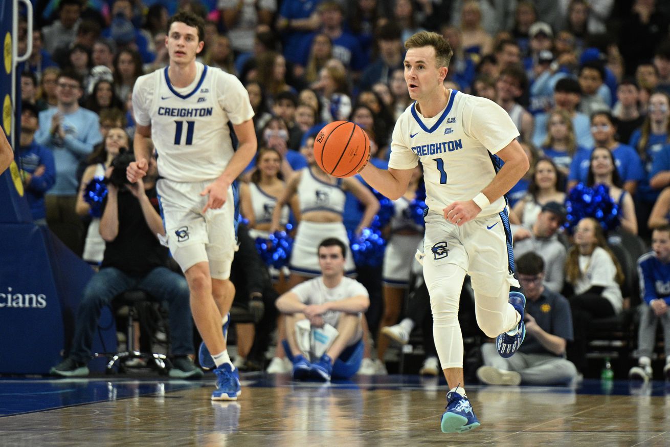 Nov 16, 2024; Omaha, Nebraska, USA; Creighton Bluejays guard Steven Ashworth (1) dribbles up the court with center Ryan Kalkbrenner (11) against the UMKC Kangaroos in the second half at CHI Health Center Omaha. Mandatory Credit: Steven Branscombe-Imagn Images