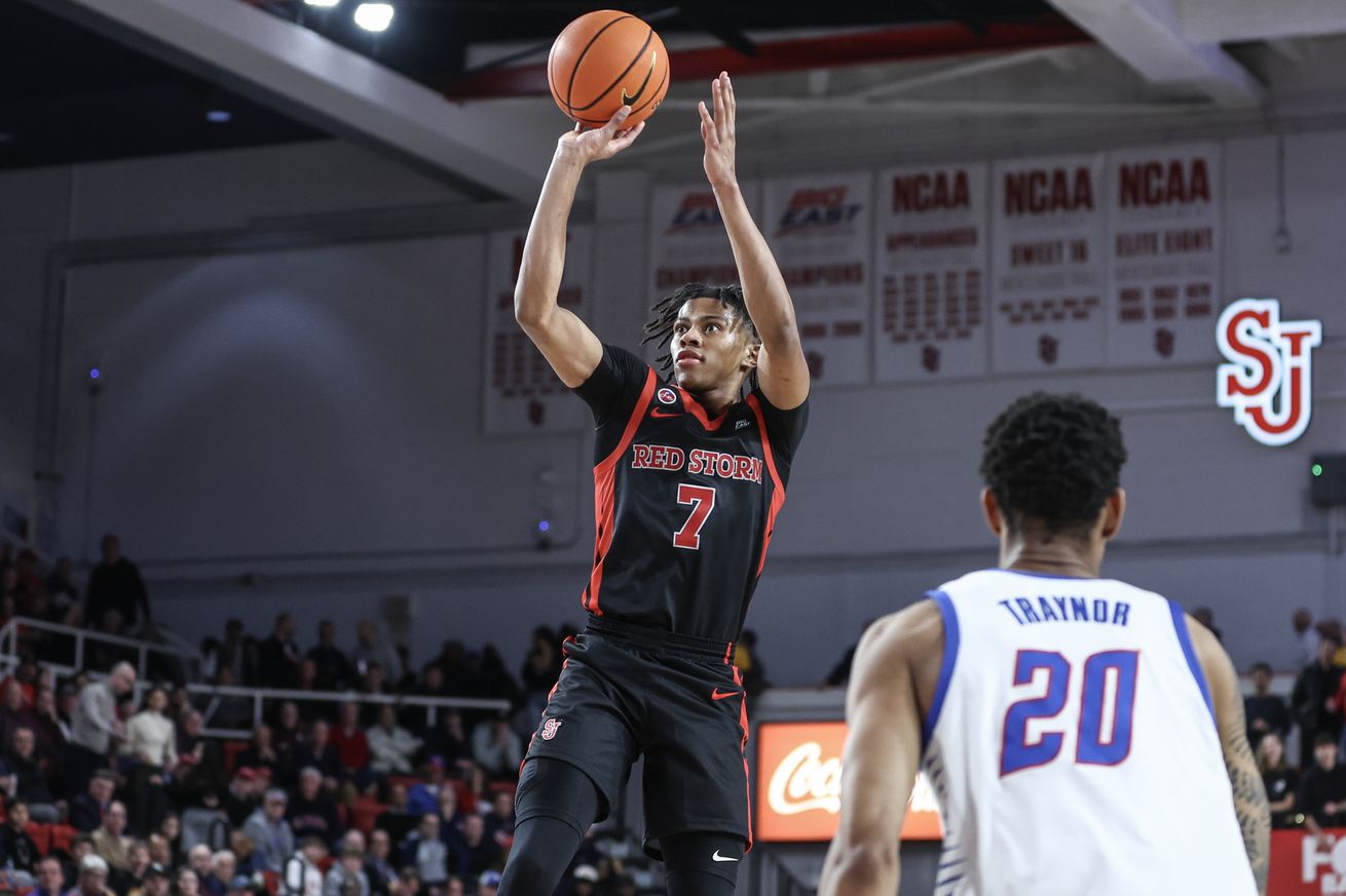 Dec 17, 2024; Queens, New York, USA; St. John’s Red Storm guard Simeon Wilcher (7) takes a three point shot in the second half against the DePaul Blue Demons at Carnesecca Arena. Mandatory Credit: Wendell Cruz-Imagn Images