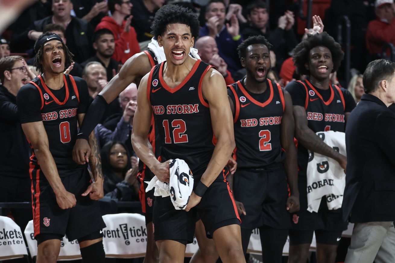 Dec 17, 2024; Queens, New York, USA; St. John’s Red Storm guard RJ Luis Jr. (12) celebrates from the bench in the second half against the DePaul Blue Demons at Carnesecca Arena. Mandatory Credit: Wendell Cruz-Imagn Images