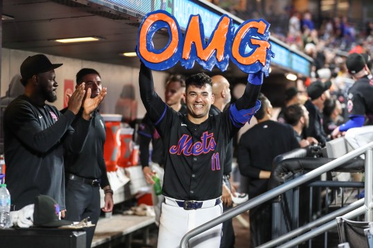 Jul 12, 2024; New York City, New York, USA;  New York Mets second baseman Jose Iglesias (11) celebrates in the dugout after hitting a solo home run in the fifth inning against the Colorado Rockies at Citi Field. Mandatory Credit: Wendell Cruz-USA TODAY Sports