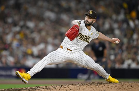 Oct 2, 2024; San Diego, California, USA; San Diego Padres pitcher Tanner Scott (66) throws during the sixth inning of game two in the Wildcard round for the 2024 MLB Playoffs against the Atlanta Braves at Petco Park. Mandatory Credit: Denis Poroy-Imagn Images