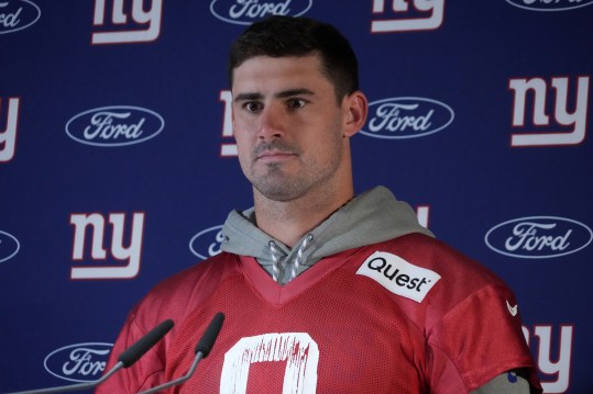 Nov 8, 2024; Munich, Germany; New York Giants quarterback Daniel Jones (8) during press conference at the FC Bayern Munchen training grounds at Sabener Strasse.  Mandatory Credit: Kirby Lee-Imagn Images