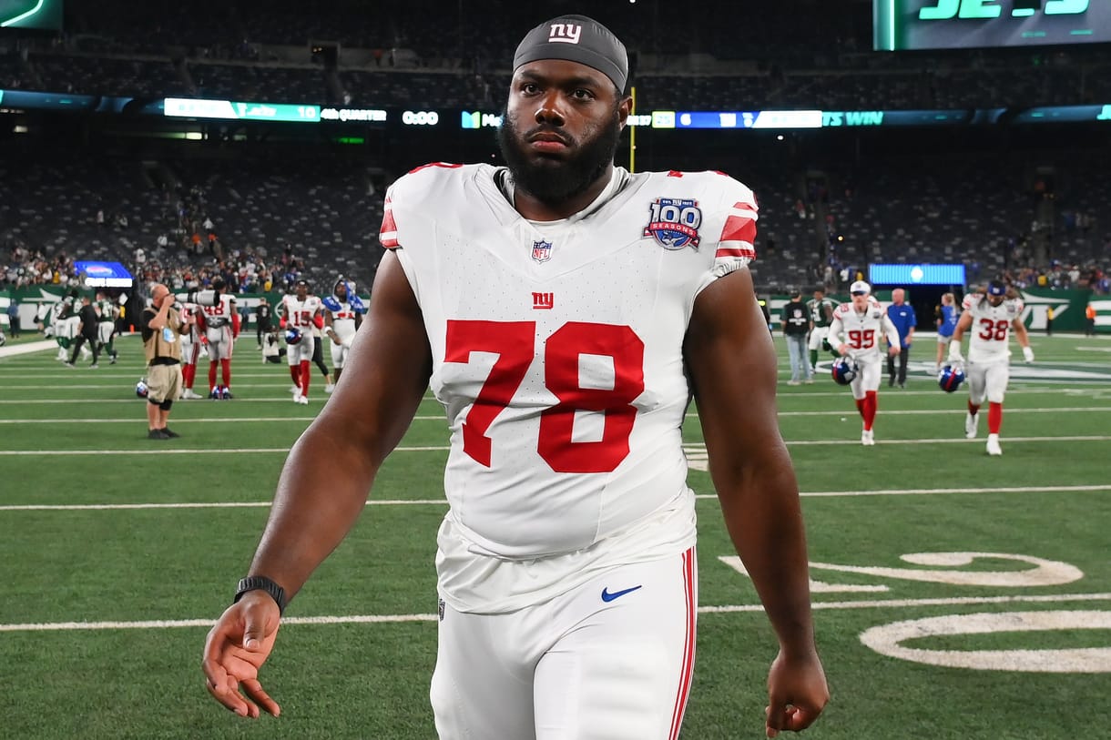 Aug 24, 2024; East Rutherford, New Jersey, USA; New York Giants offensive tackle Andrew Thomas (78) walks off the field following the game against the New York Jets at MetLife Stadium. Mandatory Credit: Rich Barnes-Imagn Images