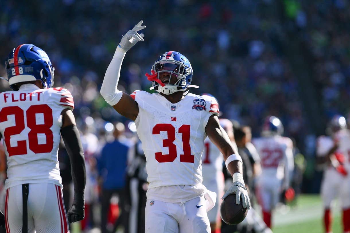 Oct 6, 2024; Seattle, Washington, USA; New York Giants safety Tyler Nubin (31) celebrates after recovering a Seattle Seahawks fumble during the second half at Lumen Field. Mandatory Credit: Steven Bisig-Imagn Images