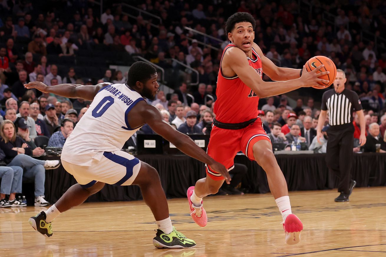 Mar 14, 2024; New York City, NY, USA; St. John’s Red Storm guard RJ Luis Jr. (12) drives to the basket against Seton Hall Pirates guard Dylan Addae-Wusu (0) during the first half at Madison Square Garden. Mandatory Credit: Brad Penner-Imagn Images