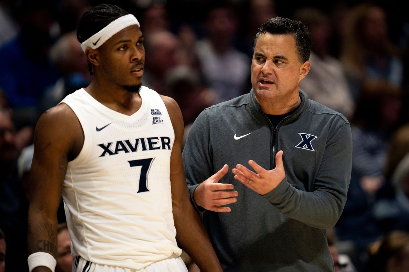 Xavier Musketeers head coach Sean Miller speaks with Xavier Musketeers guard Ryan Conwell (7) after he fouled out in the second half of the NCAA basketball game against the Seton Hall Pirates at the Cintas Center in Cincinnati on Tuesday, Dec. 31, 2024.