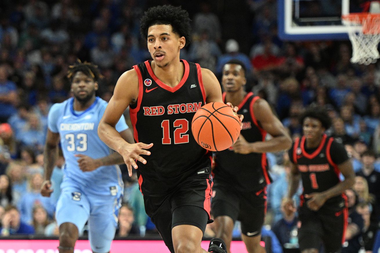 Dec 31, 2024; Omaha, Nebraska, USA; St. John’s Red Storm guard RJ Luis Jr. (12) dribbles against the Creighton Bluejays during the first half at CHI Health Center Omaha. Mandatory Credit: Steven Branscombe-Imagn Images