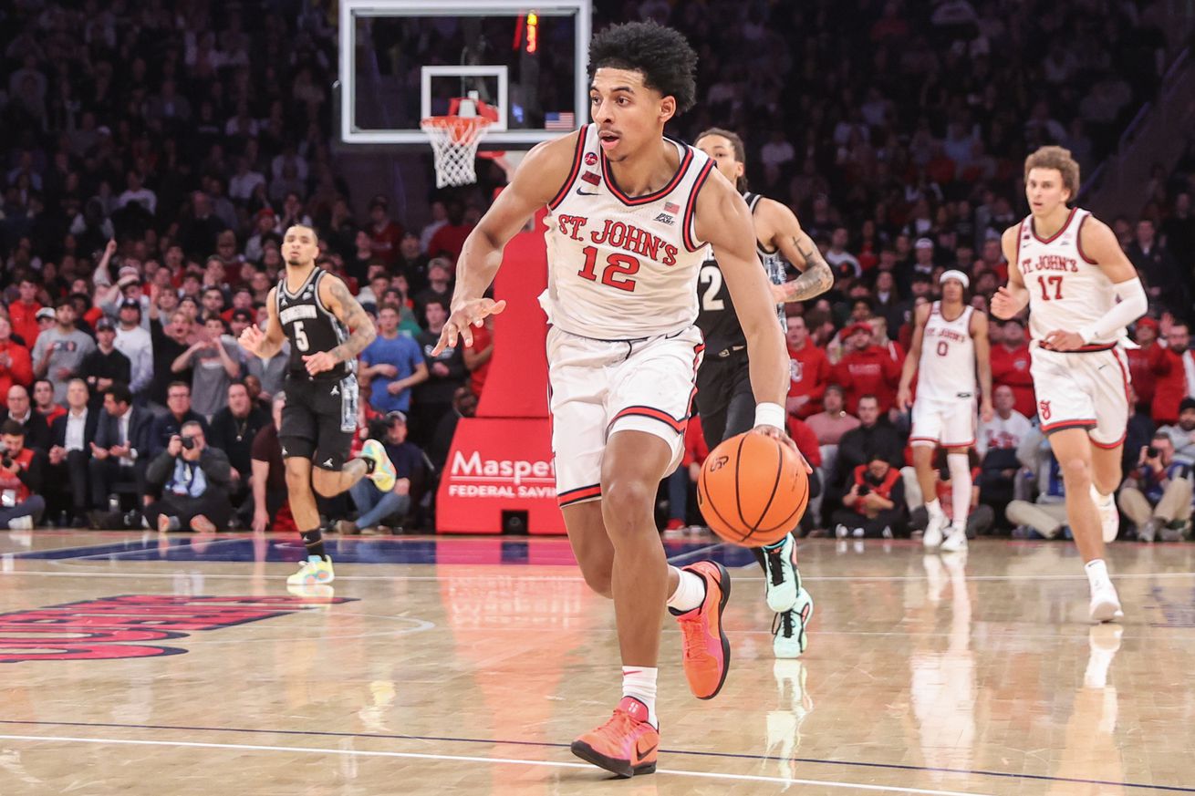 Jan 14, 2025; New York, New York, USA; St. John’s Red Storm guard RJ Luis Jr. (12) brings the ball up court in the second half against the Georgetown Hoyas at Madison Square Garden. Mandatory Credit: Wendell Cruz-Imagn Images