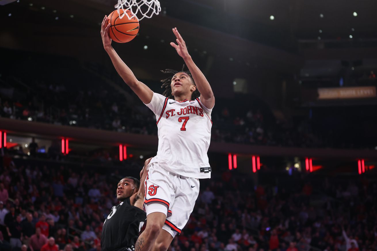 Jan 22, 2025; New York, New York, USA; St. John’s Red Storm guard Simeon Wilcher (7) goes in for a layup in the second half against the Xavier Musketeers at Madison Square Garden. Mandatory Credit: Wendell Cruz-Imagn Images