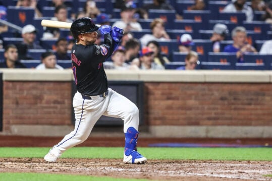 Jul 12, 2024; New York City, New York, USA;  New York Mets second baseman Jose Iglesias (11) hits a solo home run in the fifth inning against the Colorado Rockies at Citi Field. Mandatory Credit: Wendell Cruz-USA TODAY Sports