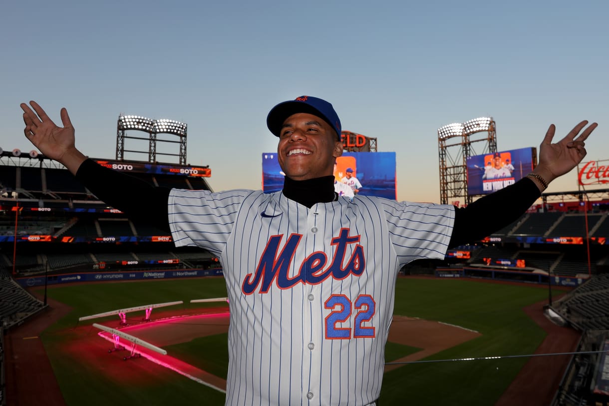 Dec 12, 2024; Flushing, NY, USA; New York Mets right fielder Juan Soto poses for photos during his introductory press conference at Citi Field. Mandatory Credit: Brad Penner-Imagn Images