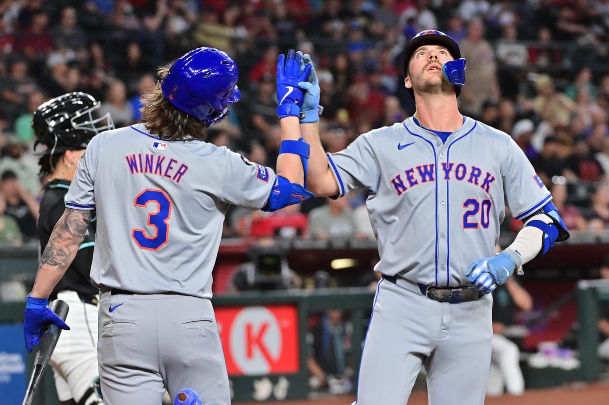 Aug 29, 2024; Phoenix, Arizona, USA;  New York Mets first base Pete Alonso (20) celebrates with outfielder Jesse Winker (3) after hitting a solo home run in the second inning against the Arizona Diamondbacks at Chase Field. Mandatory Credit: Matt Kartozian-USA TODAY Sports