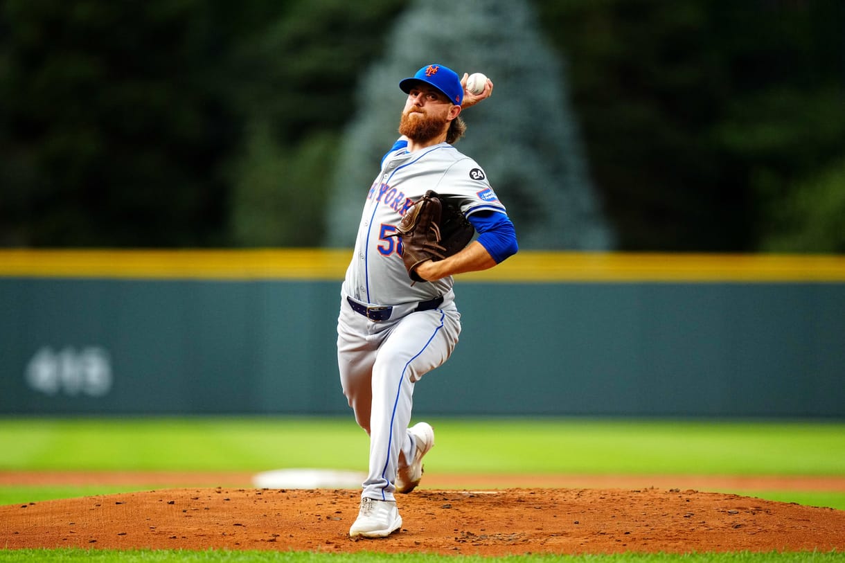 Aug 7, 2024; Denver, Colorado, USA; New York Mets starting pitcher Paul Blackburn (58) delivers a pitch in the first inning against the Colorado Rockies at Coors Field. Mandatory Credit: Ron Chenoy-USA TODAY Sports