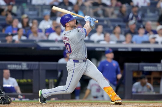 Jul 24, 2024; Bronx, New York, USA; New York Mets first baseman Pete Alonso (20) follows through on a two run home run against the New York Yankees during the fourth inning at Yankee Stadium. Mandatory Credit: Brad Penner-Imagn Images