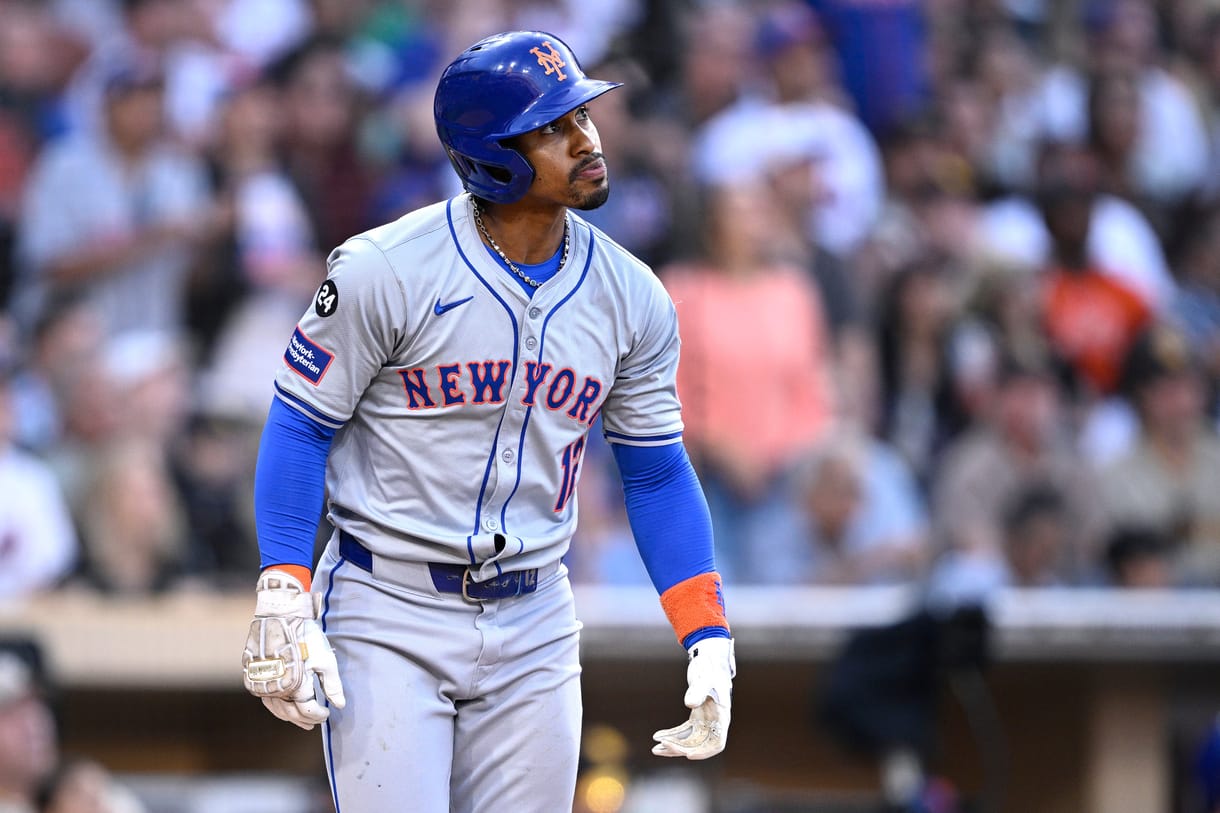 Aug 24, 2024; San Diego, California, USA; New York Mets shortstop Francisco Lindor (12) hits a grand slam home run against the San Diego Padres during the fourth inning at Petco Park. Mandatory Credit: Orlando Ramirez-USA TODAY Sports