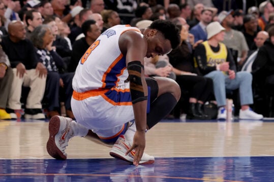 Feb 1, 2025; New York, New York, USA; New York Knicks forward OG Anunoby (8) reacts during the second quarter against the Los Angeles Lakers at Madison Square Garden. Mandatory Credit: Brad Penner-Imagn Images