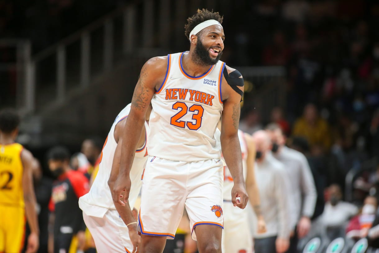 Jan 15, 2022; Atlanta, Georgia, USA; New York Knicks center Mitchell Robinson (23) celebrates after a dunk against the Atlanta Hawks in the second half at State Farm Arena. Mandatory Credit: Brett Davis-Imagn Images