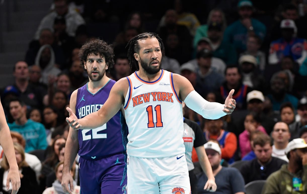 Nov 29, 2024; Charlotte, North Carolina, USA;  New York Knicks guard Jalen Brunson (11) complains about a possible foul during the second half against the Charlotte Hornets at the Spectrum Center. Mandatory Credit: Sam Sharpe-Imagn Images