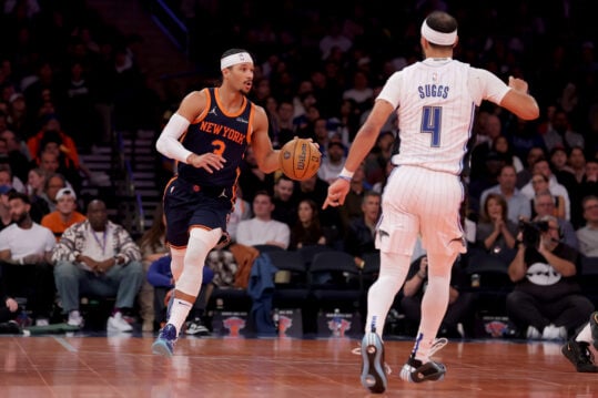 Dec 3, 2024; New York, New York, USA; New York Knicks guard Josh Hart (3) brings the ball up court against Orlando Magic guard Jalen Suggs (4) during the third quarter at Madison Square Garden. Mandatory Credit: Brad Penner-Imagn Images