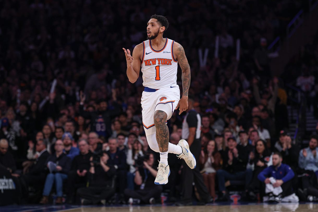 Jan 1, 2025; New York, New York, USA; New York Knicks guard Cameron Payne (1) reacts after a three point basket during the first half against the Utah Jazz at Madison Square Garden. Mandatory Credit: Vincent Carchietta-Imagn Images