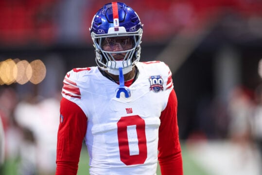 Dec 22, 2024; Atlanta, Georgia, USA; New York Giants linebacker Brian Burns (0) on the field before a game against the Atlanta Falcons at Mercedes-Benz Stadium. Mandatory Credit: Brett Davis-Imagn Images