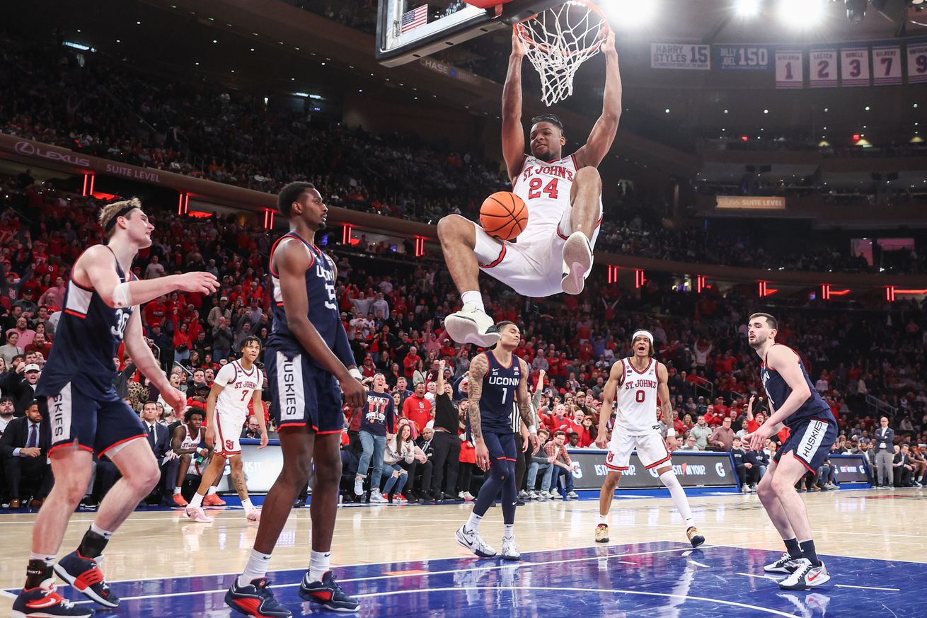 Feb 23, 2025; New York, New York, USA; St. John’s Red Storm forward Zuby Ejiofor (24) dunks in the second half against the Connecticut Huskies at Madison Square Garden. Mandatory Credit: Wendell Cruz-Imagn Images