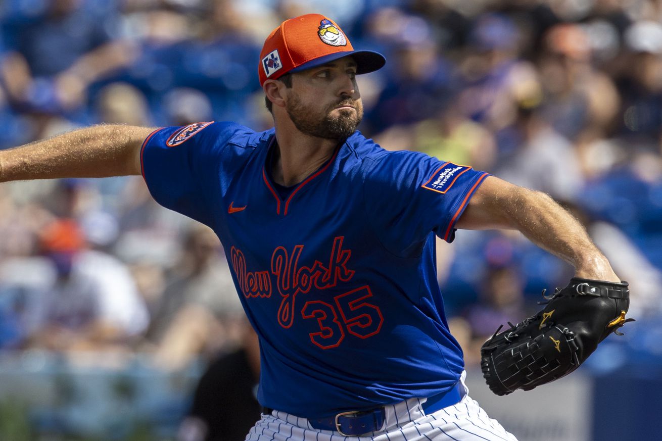 New York Mets pitcher Clay Holmes throws during a spring training game